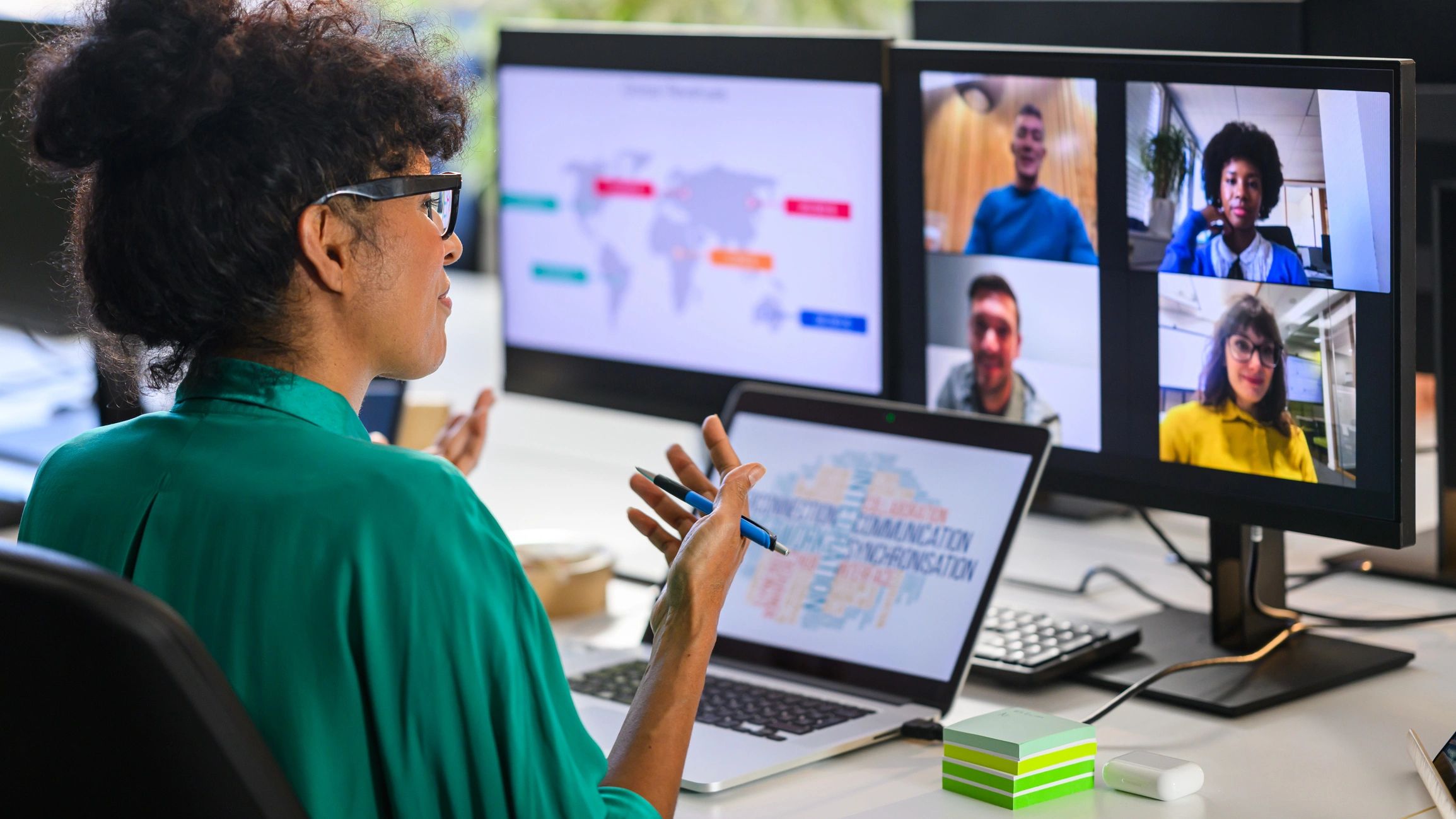 Business analyst reviewing data with remote team